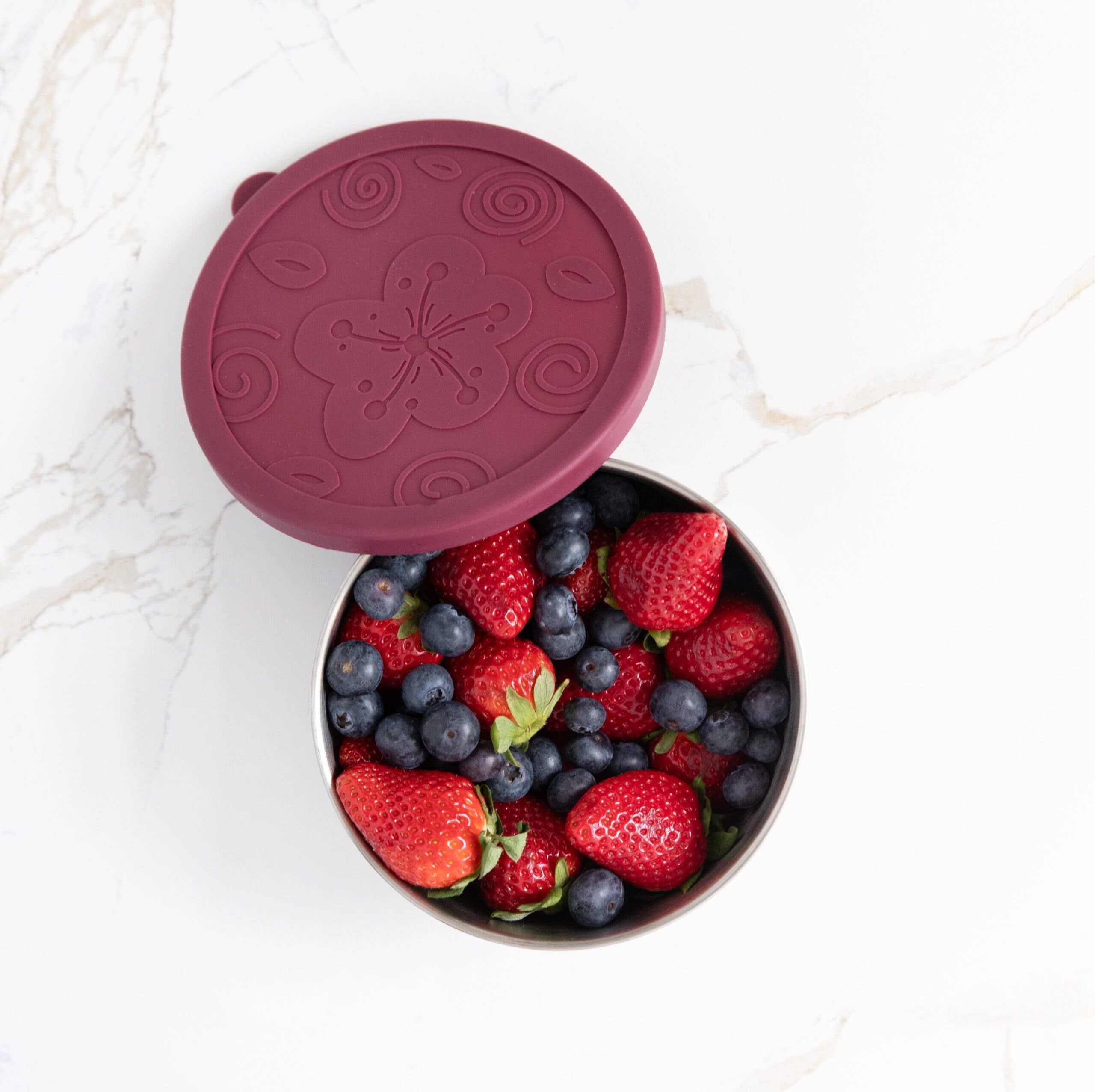 Stainless steel food container with silicone lid