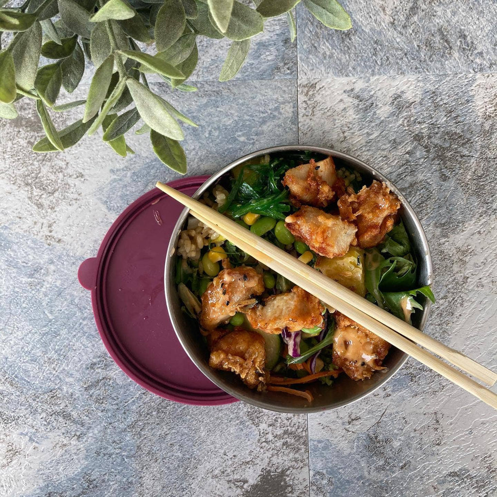 Stainless steel food container with silicone lid